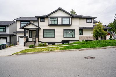 6228 135 St, Home with 4 bedrooms, 3 bathrooms and 2 parking in Surrey BC | Image 1