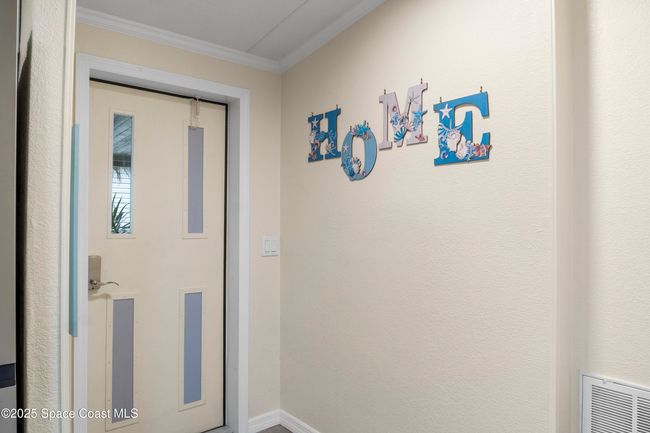 1039 Wren Cir, House other with 3 bedrooms, 2 bathrooms and null parking in Barefoot Bay FL | Image 9