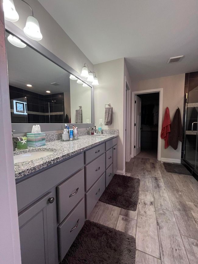 Dual Vanity upgraded flooring, tile, fixtures | Image 26