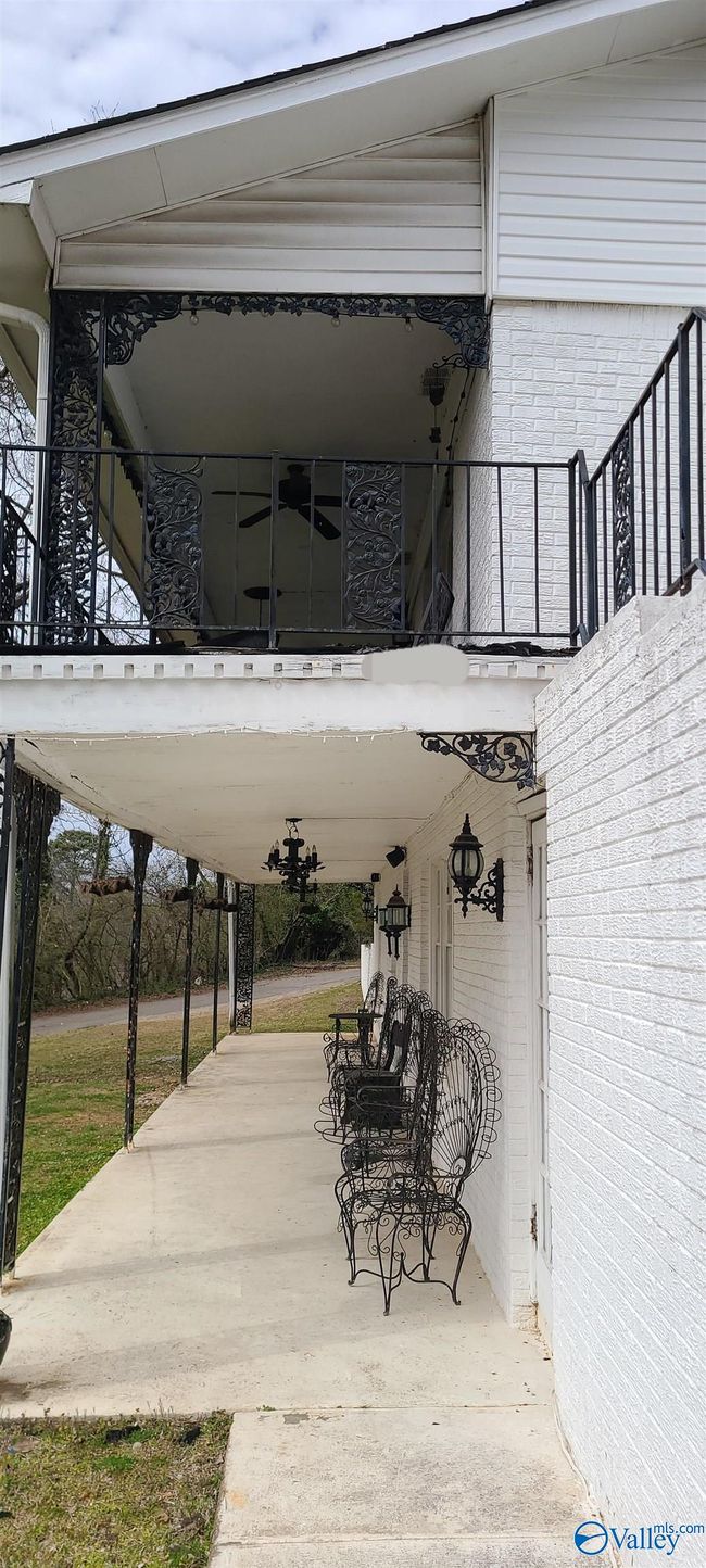 Long covered balcony ideal for lunch or smoke breaks | Image 8