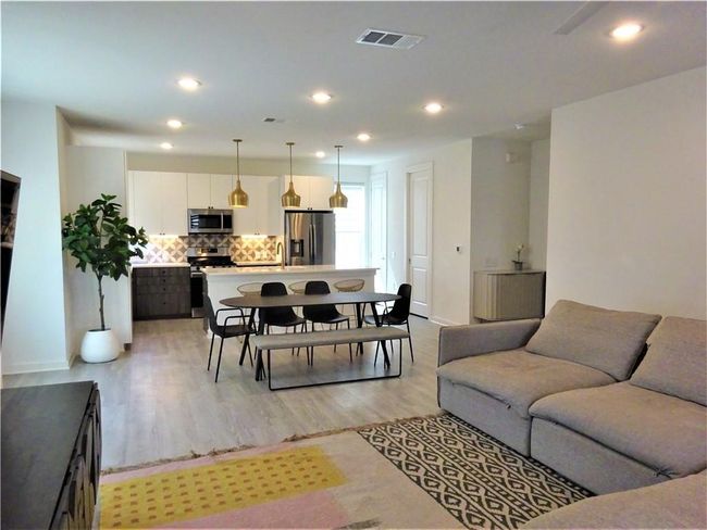 Living area featuring recessed lighting, light wood-style flooring, and baseboards | Image 8