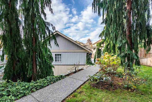 View of side of property with fence | Image 8
