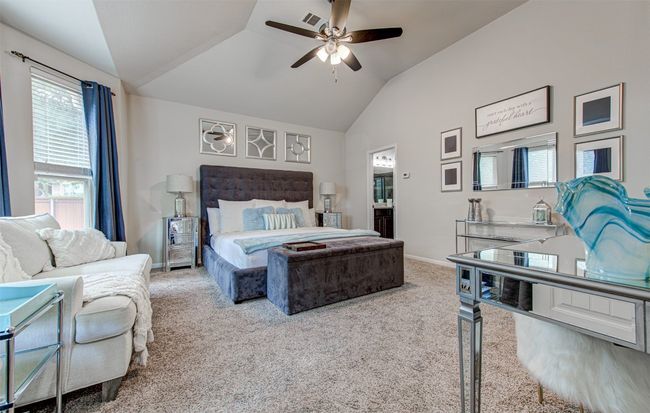 Enjoy Airy Sophistication in the Primary Bedroom, Accentuated by High Ceilings for an Elevated Sense of Space and Comfort | Image 26