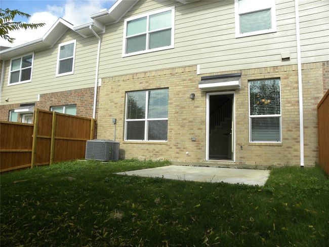 Back of house with brick siding and a patio | Image 30