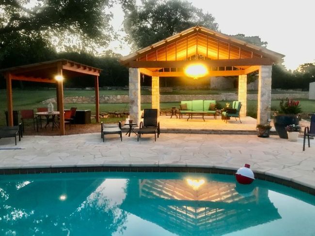Outdoor pool with a gazebo, outdoor lounge area, and a patio | Image 26