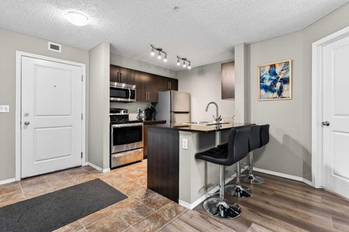 9103-403 Mackenzie Way Sw, Airdrie, AB, T4B3V7 | Card Image