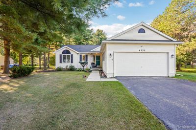 4535 Leeward Drive, Home with 4 bedrooms, 2 bathrooms and null parking in Henrietta Twp MI | Image 1