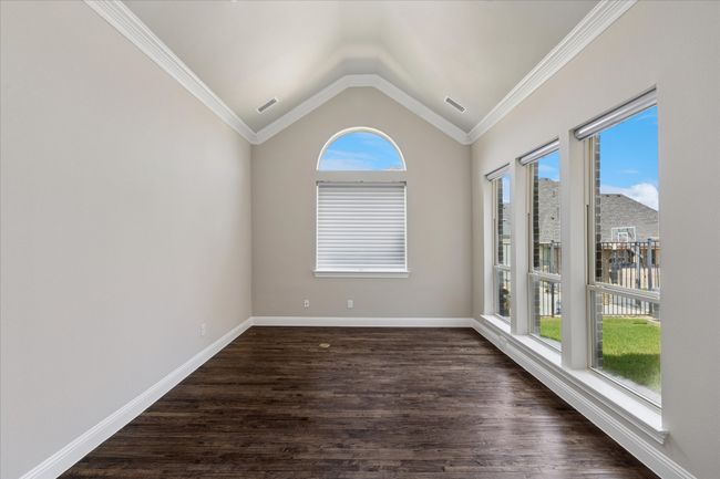 Office at the back of the home with French doors and wall of windows for natural light. Would make a great study or library | Image 17