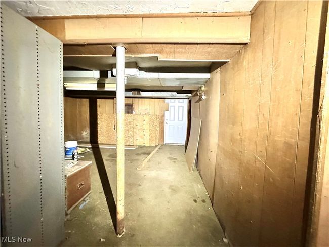 View of unfinished below grade area with walkout to back yard . | Image 34