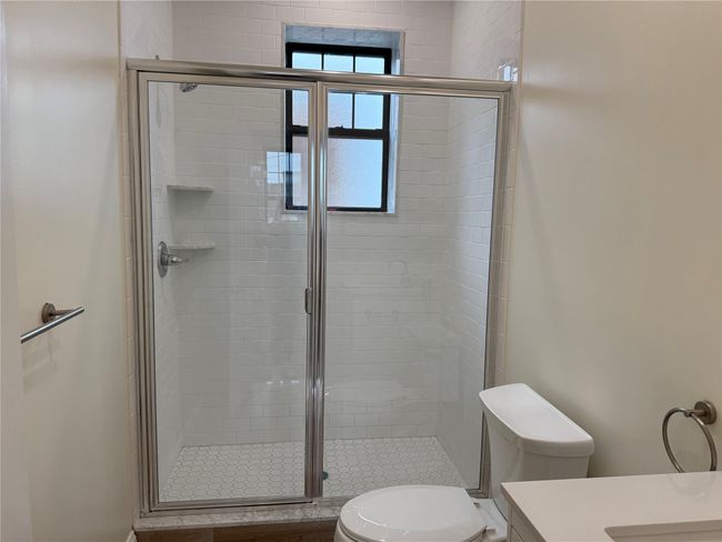 Full bath featuring vanity and a stall shower | Image 10