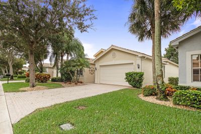 8190 Azure Coast Boulevard, House other with 3 bedrooms, 2 bathrooms and null parking in Lake Worth FL | Image 2