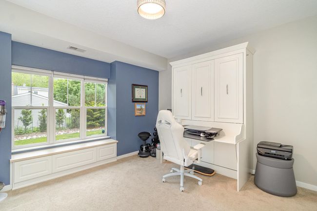 This built in murphy bed/desk stays with the property. Such a rare and fantastic feature! | Image 19
