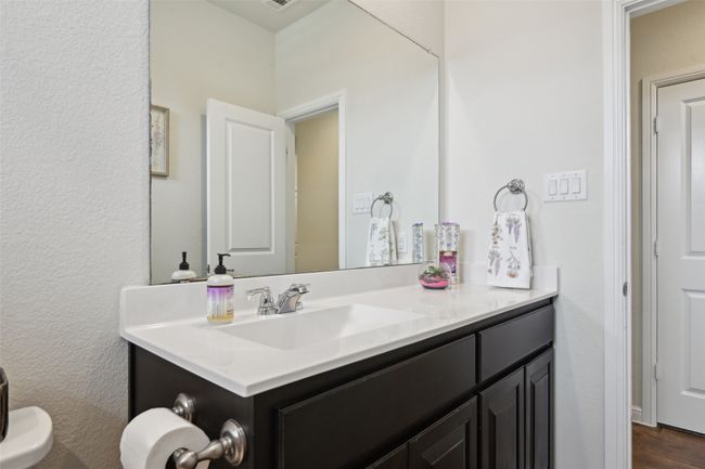 Bathroom featuring vanity, wood finished floors, and toilet | Image 24