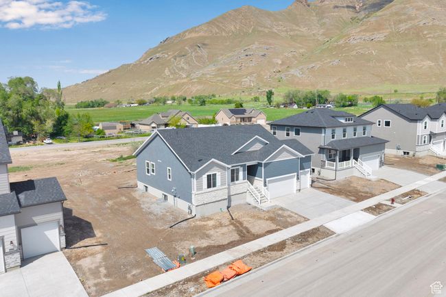 View of mountain background featuring nearby suburban area | Image 32