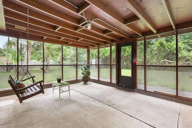 Enjoy the Screened-In Porch with a Nature View & no Back Neighbors | Image 15