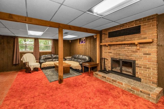 Vintage lower family room with fireplace | Image 19