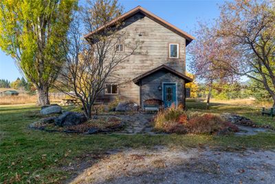 View of home's exterior featuring a yard | Image 1