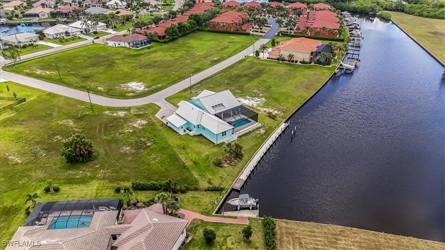 Aerial view of residential area with a nearby body of water | Image 38
