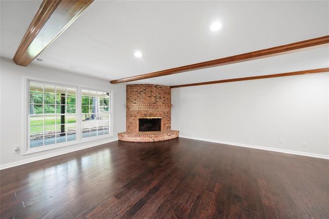 Family room with custom fireplace | Image 14