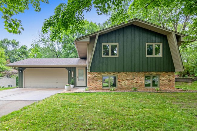 Welcome home to 6980 Crest Drive! A wonderfully updated 4 bedroom, 2 bathroom, 2 car garage walkout split level home. | Image 24