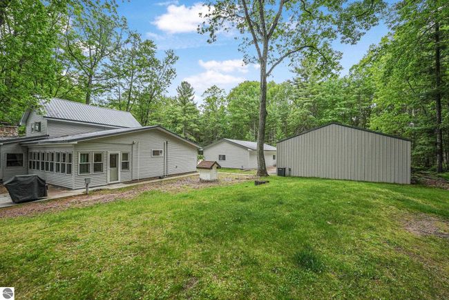 6836 Aarwood Trl Nw, House other with 4 bedrooms, 2 bathrooms and null parking in Rapid City MI | Image 45