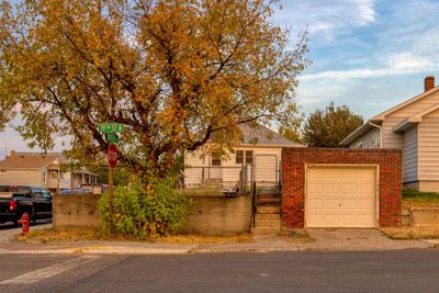 View of front facade with a garage | Image 1