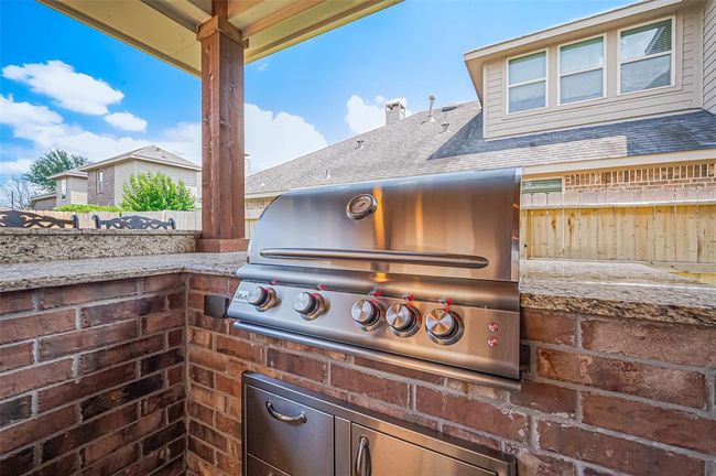 Fire up the built-in gas grill for effortless outdoor meals—convenient, efficient, and ready when you are. | Image 39