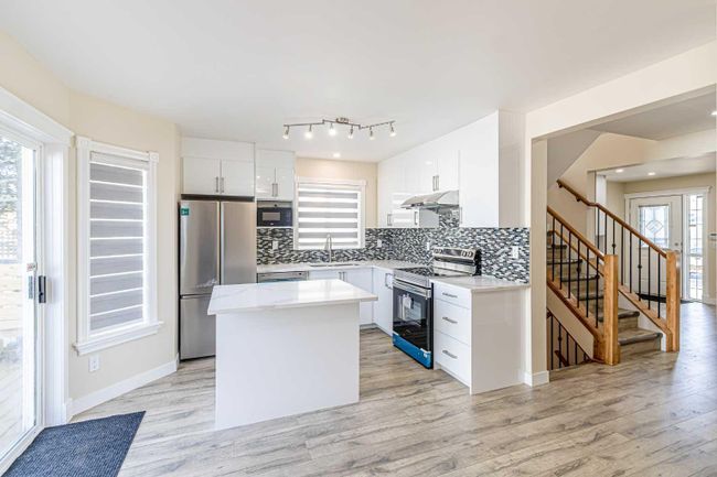 42 Coverdale Way Ne, Home with 4 bedrooms, 3 bathrooms and 4 parking in Calgary AB | Image 8
