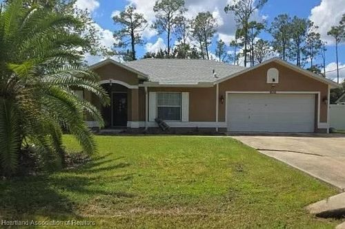 65 Kalamazoo Trl, PALM COAST, FL, 32164-5633 | Card Image