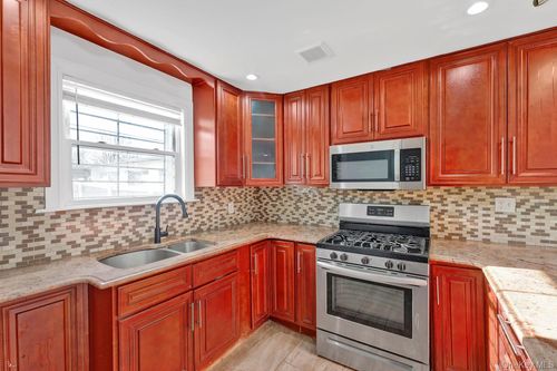 16418 109th Dr, Jamaica, NY, 11433-2914 | Card Image