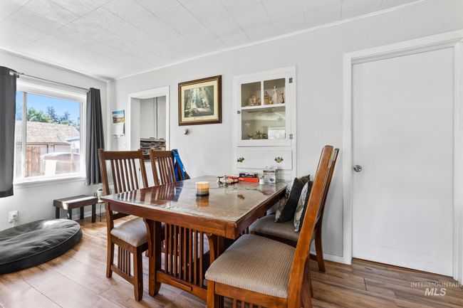 Dining room featuring wood finished floors | Image 9