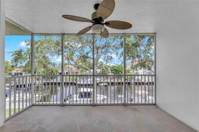 Great screened porch to enjoy on the water | Image 3