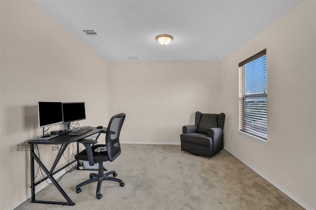 Carpeted office space featuring baseboards | Image 26