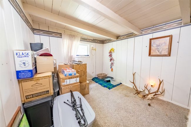Below grade area with carpet and wooden ceiling | Image 33