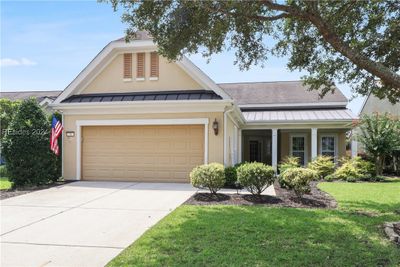 View of front of home with a garage and a front yard | Image 2