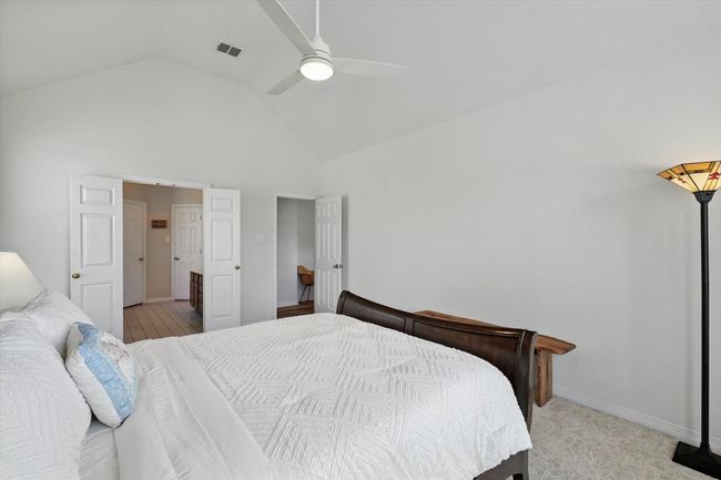 Bedroom with ceiling fan and high vaulted ceiling | Image 20