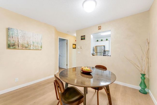 Dining room featuring light wood finished floors and baseboards | Image 21