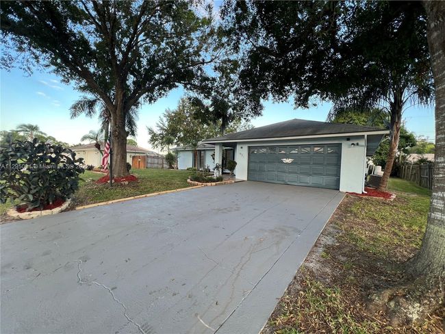 1921 Sw Hickock Ter, House other with 3 bedrooms, 2 bathrooms and null parking in Port St. Lucie FL | Image 51