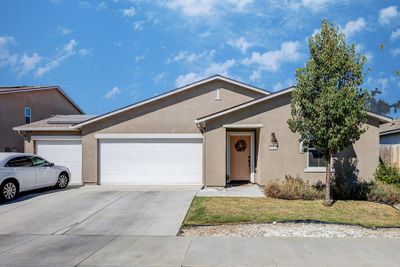 128 E Porter Avenue, House other with 4 bedrooms, 3 bathrooms and null parking in Visalia CA | Image 1