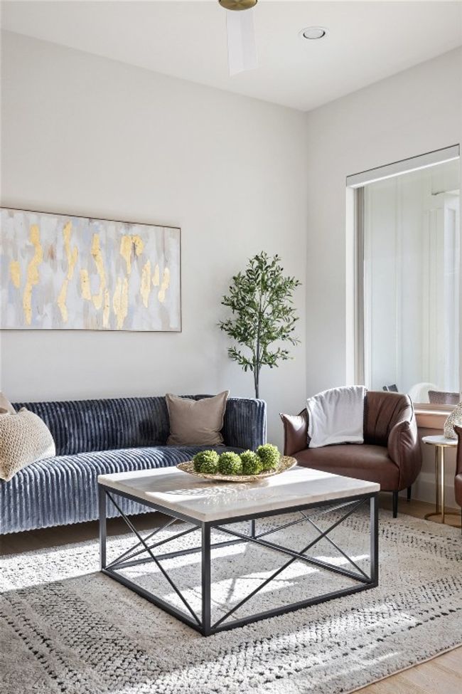 Living area with wood finished floors | Image 5
