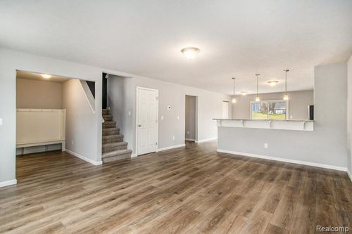 3157 Wild Orchid Ln, Burton, MI, 48519-1584 | Card Image