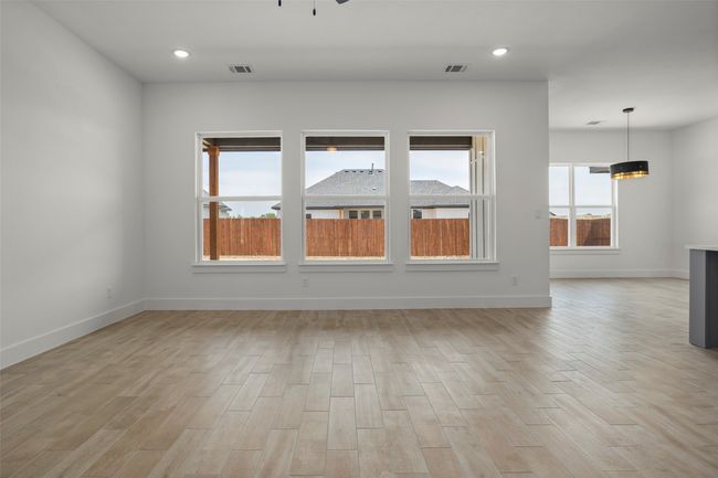 Unfurnished room featuring light wood-type flooring | Image 4