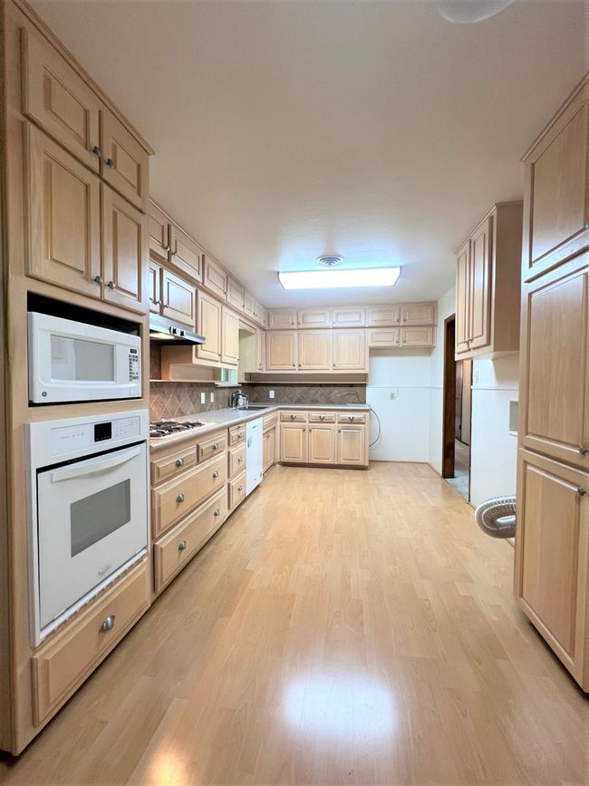 Kitchen with washer & dryer connectionstaken prior to being occupied | Image 7