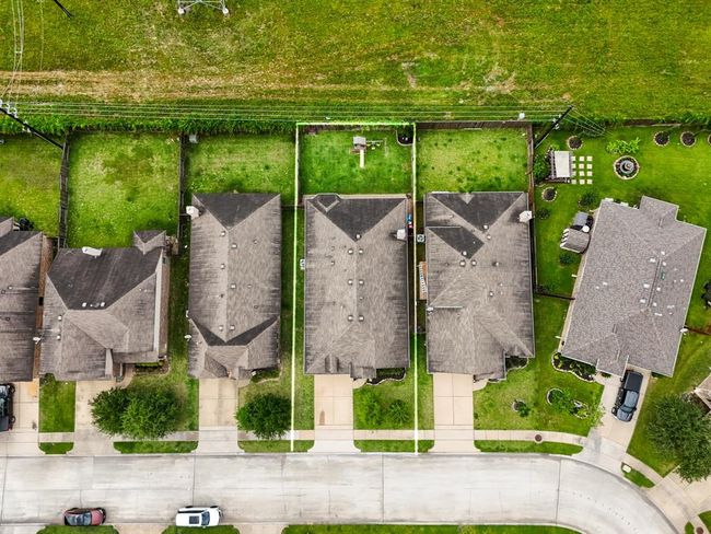 A crisp bird’s-eye view looking straight down showcases the home’s footprint, the spacious yard, and the thoughtful layout that makes this property feel both open and inviting from every angle. | Image 40