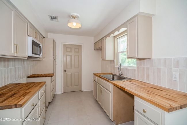 1671 Ollie St, House other with 3 bedrooms, 2 bathrooms and null parking in Cocoa FL | Image 4
