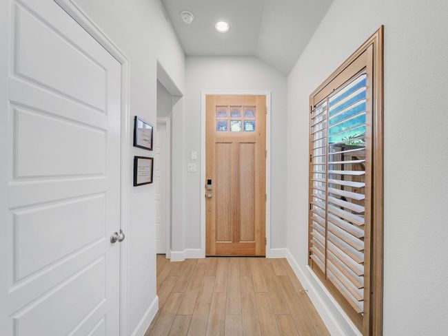 Doorway to outside with light wood finished floors and recessed lighting | Image 4