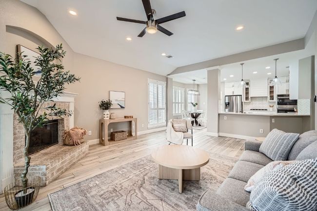Open concept with room for stools at the bar! | Image 14