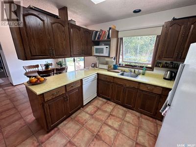 706 Donald St, House other with 5 bedrooms, 4 bathrooms and null parking in Hudson Bay SK | Image 3