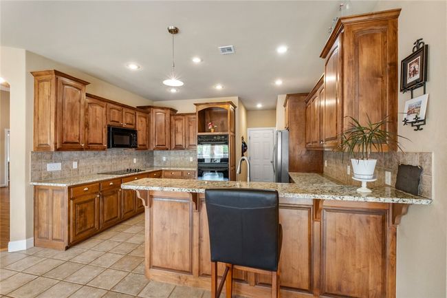 Double ovens, updated kitchen with new granite | Image 13