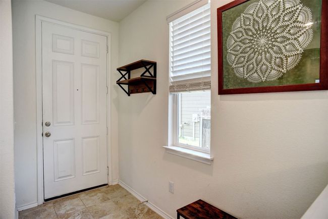 Entryway featuring baseboards | Image 15